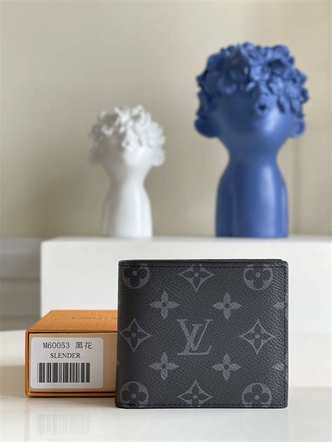 Louis Vuitton Men's Amerigo Wallet in Monogram .